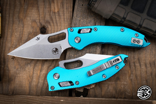 Microtech Stitch Ram-Lok Manual Folder Turquoise Fluted Aluminum 3.75" M390 Stonewash Serrated 169RL-10FLTQ